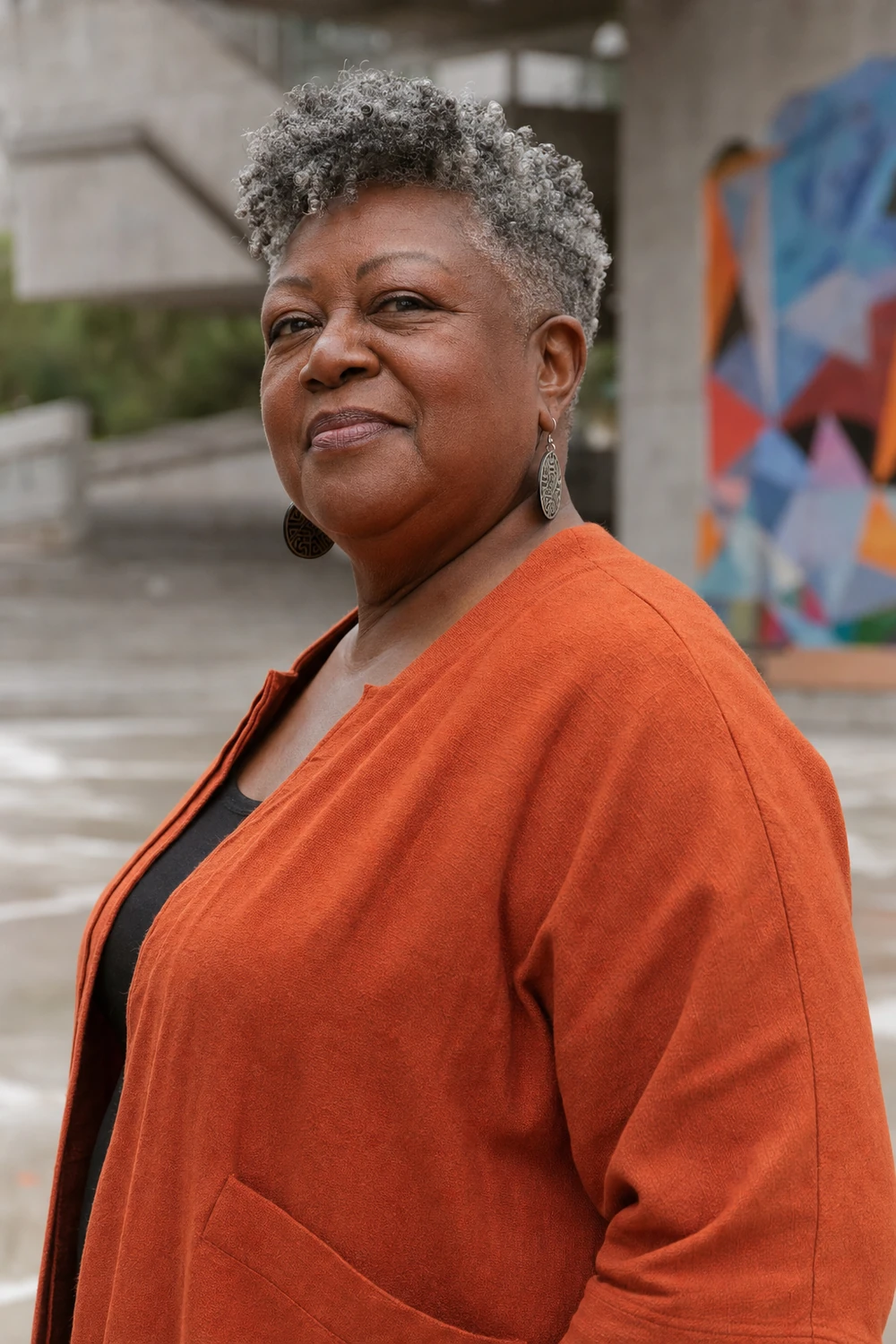 Older plus size Black woman with a tapered natural curly haircut