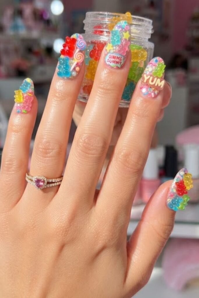 Nails with 3D gummy bear charms set in clear gel