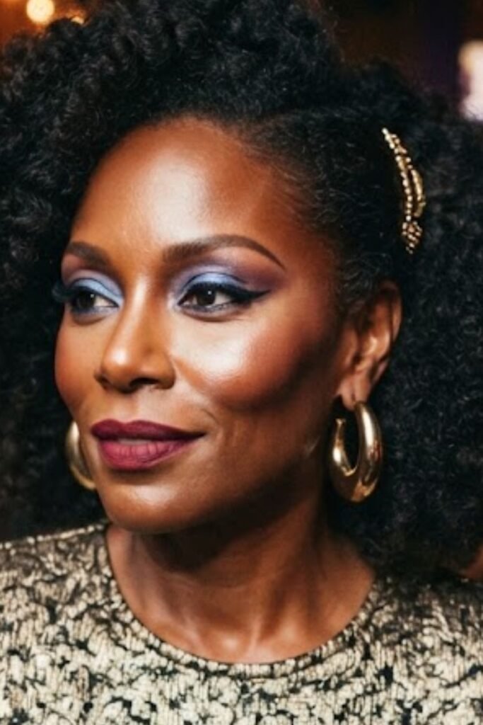 Woman with a bronzed and contoured 80s makeup look