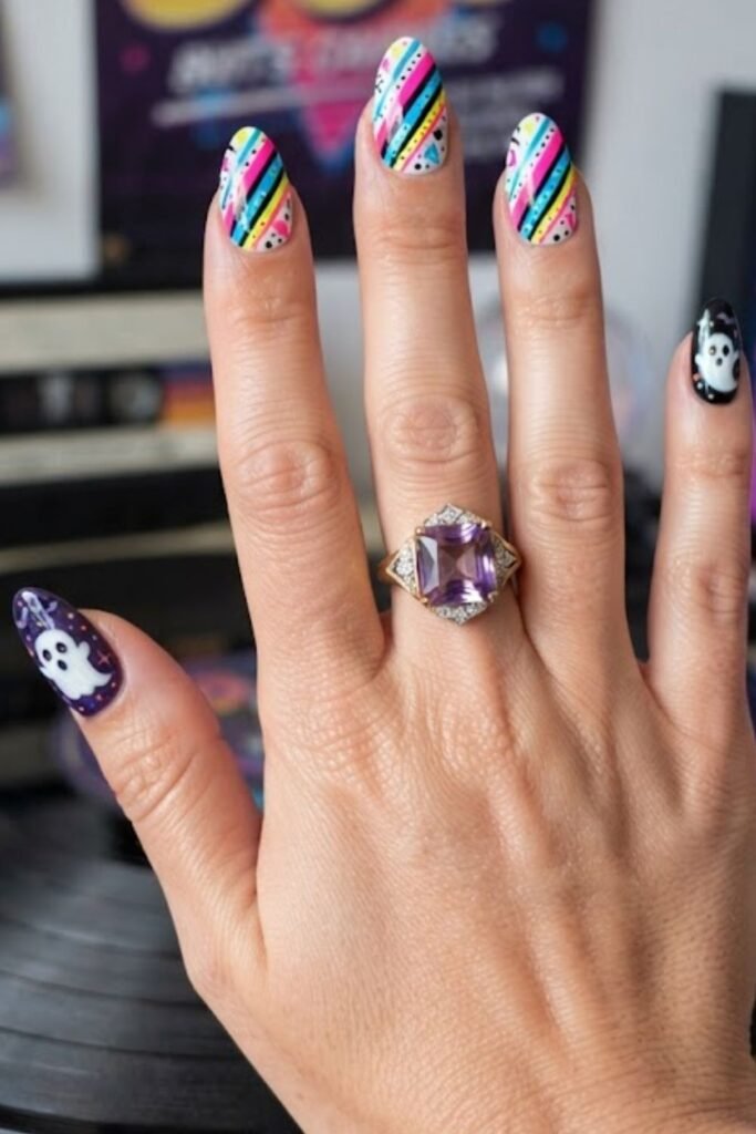 Bold diagonal stripe nails in contrasting 80s colors