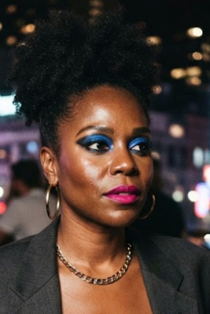 Woman with warm bronzed 80s fitness chic makeup and coral gloss