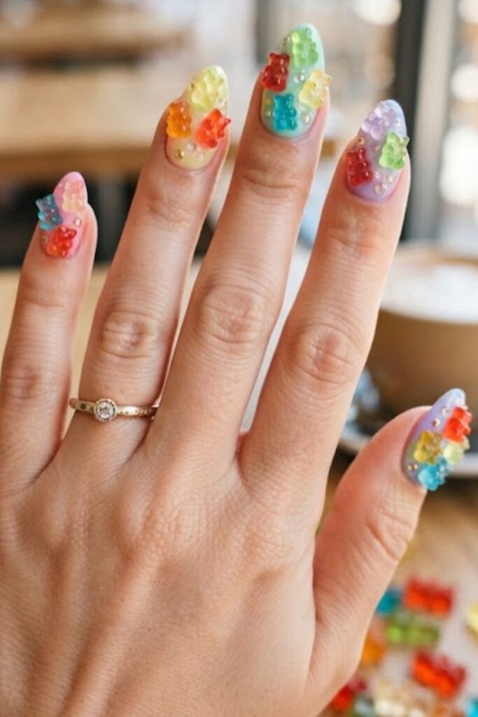 Scattered gummy bear nail art in mixed candy colors