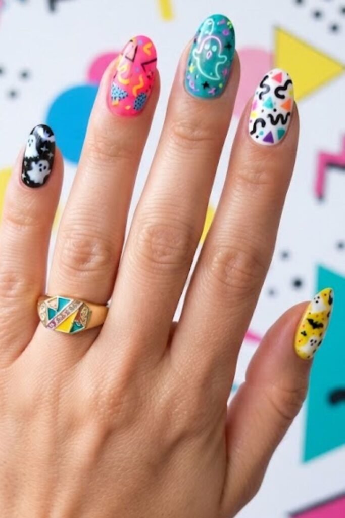 Memphis design nail art with squiggles, dots and triangles on white