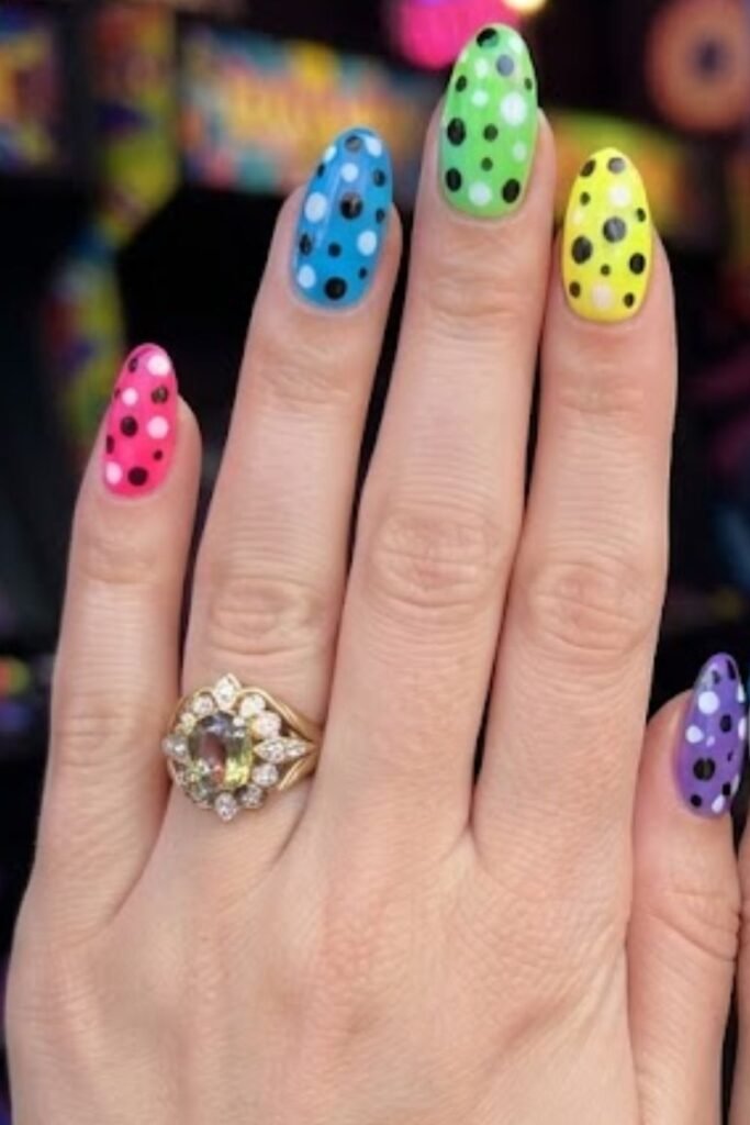 Large polka dots on bright neon nails