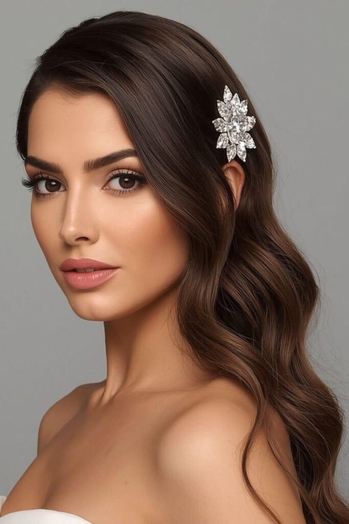Side-swept bridal waves with a floral clip