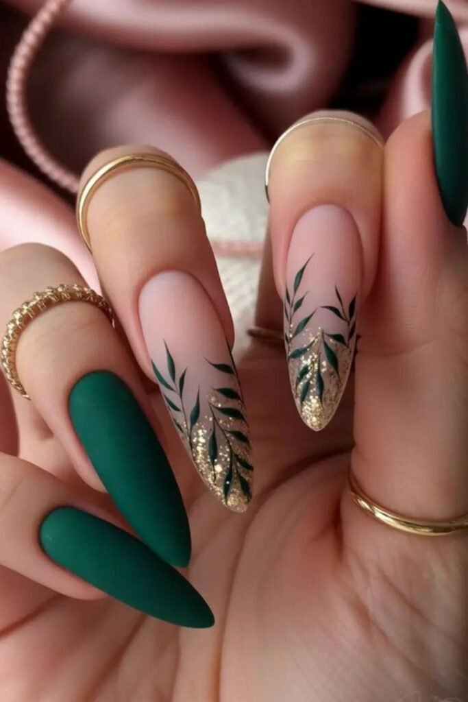 Nude and forest green nails with botanical leaf accents
