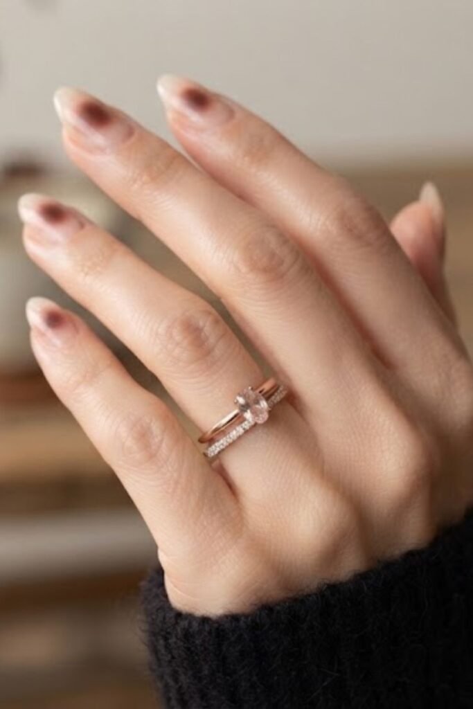 Cherry mocha aura nails with a nude base