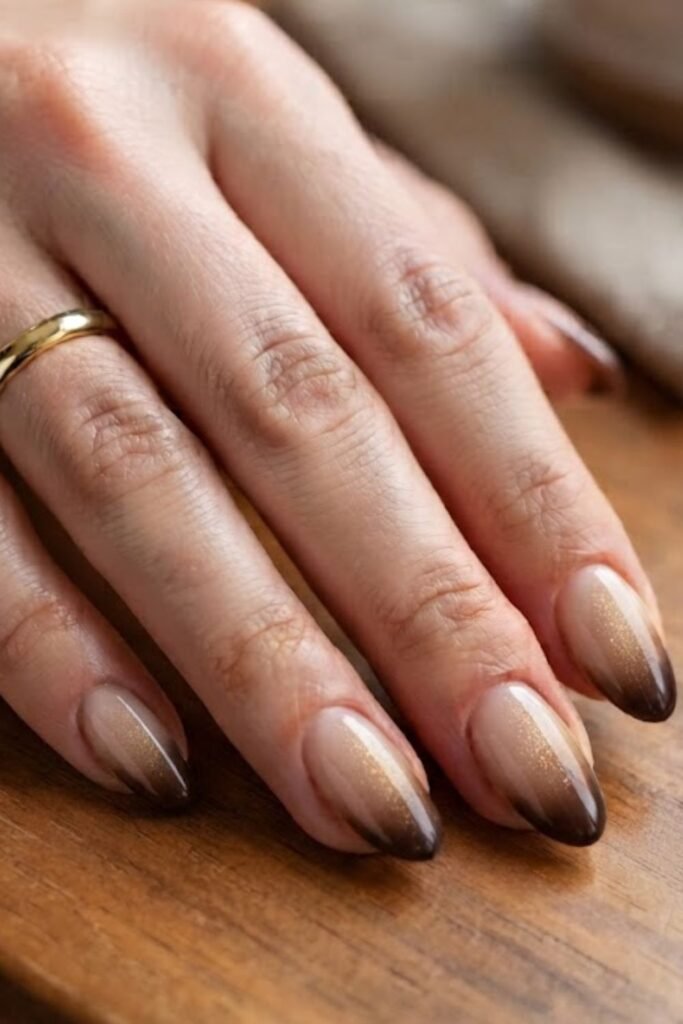 Espresso ombre nails with fine gold shimmer