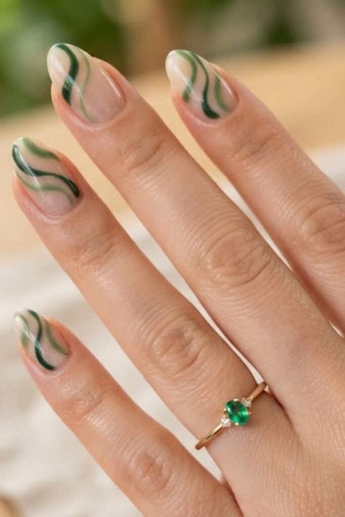 Forest green and cream swirl nail art