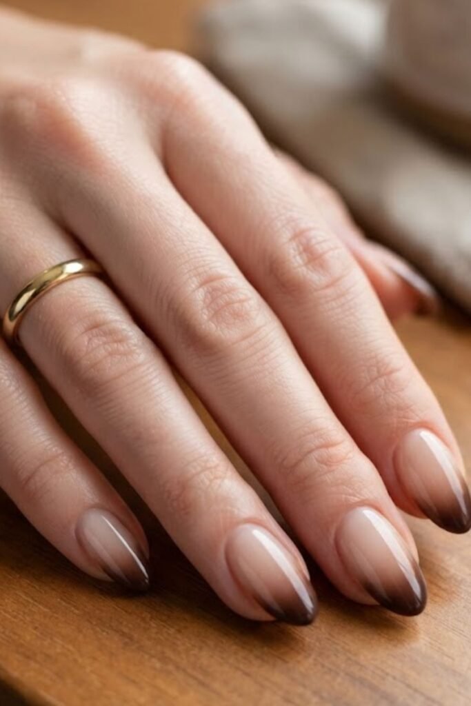 Mocha French ombre nails on a sheer latte base