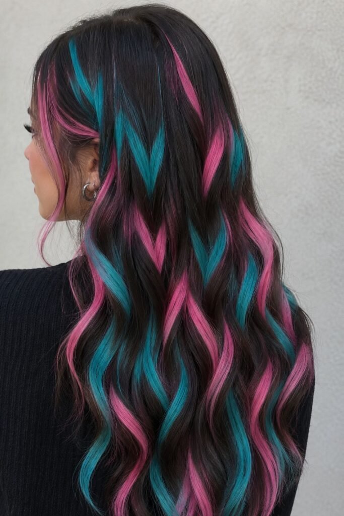 Blonde hair with alternating pink and teal zigzag highlights